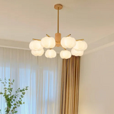 Araña creativa de madera con bolas de algodón para el salón