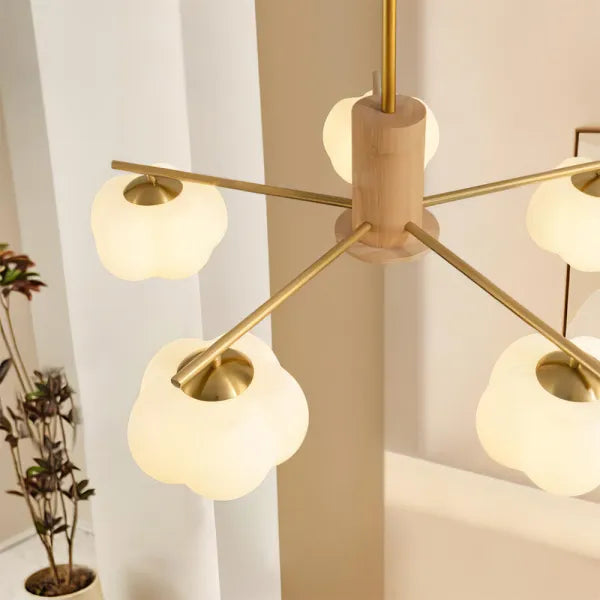 Araña creativa de madera con bolas de algodón para el salón